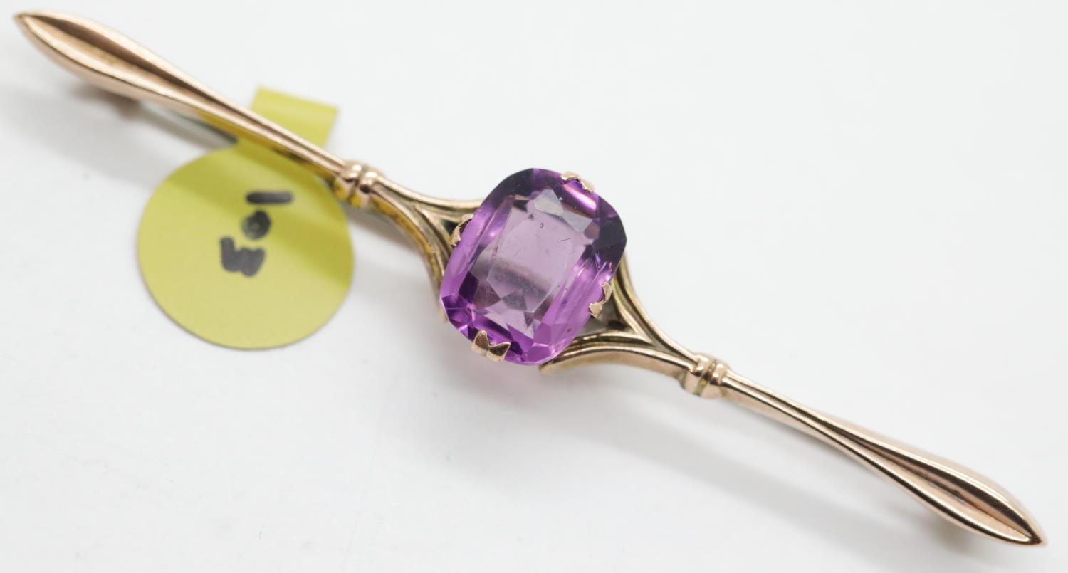 Antique 9ct rose gold, large amethyst brooch, L: 65mm, 2.7g. P&P Group 1 (£14+VAT for the first