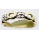 Ladies 9ct gold fancy diamond ring, size M, 2.9g. P&P Group 1 (£14+VAT for the first lot and £1+