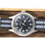 A gentleman's stainless steel British Military Omega RAF pilots wristwatch dated 1956, with black