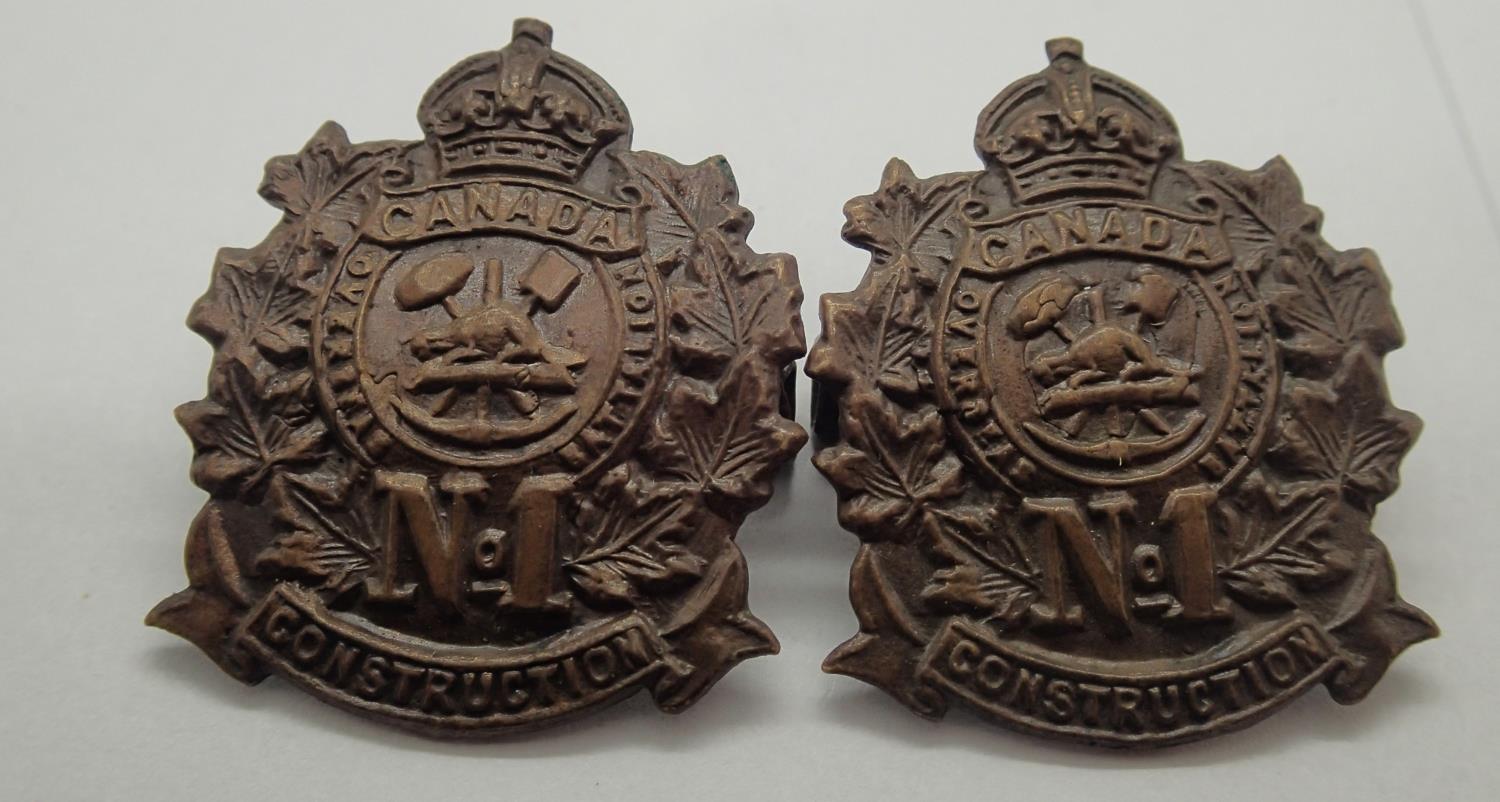 WWI Canadian style CEF No. 1 Construction Company collar badges, this regiment being responsible for