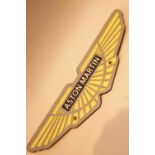 Cast iron Aston Martin sign, L: 34 cm. P&P Group 2 (£18+VAT for the first lot and £2+VAT for