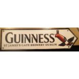 Cast iron Guinness sign, L: 38 cm. P&P Group 2 (£18+VAT for the first lot and £2+VAT for