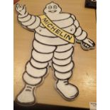 Cast iron Michelin Man sign, H: 34 cm. P&P Group 2 (£18+VAT for the first lot and £2+VAT for