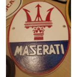 Cast iron Maserati wall sign, L: 29 cm. P&P Group 2 (£18+VAT for the first lot and £2+VAT for