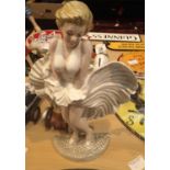 Cast iron Marilyn Monroe doorstop, H: 33 cm. P&P Group 2 (£18+VAT for the first lot and £2+VAT for