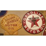 Two cast iron signs Texaco and Shell Motor Oil. P&P Group 3 (£25+VAT for the first lot and £5+VAT