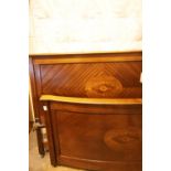 Edwardian inlaid mahogany double bed frame comprising a large upstanding headboard and curved