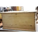 Large antique pine chest with iron hinges and carry handles, 104 x 63 x 52 cm. This lot is not