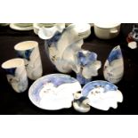 Eight ceramic vases and plates with a love birds theme, signature illegible. This lot is not