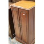 Contemporary mahogany double door CD cabinet, 100 x 47 x 39 cm. This lot is not available for in-