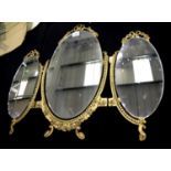 Decorative gilt framed bifold dressing table mirror. This lot is not available for in-house P&P.