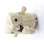 Vintage hand carved novelty tape measure in the form of an owl holding a rat. Possibly bone? P&P