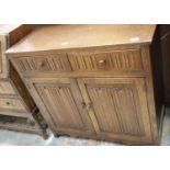 Oak dresser with linenfold decoration, 91 x 44 cm. This lot is not available for in-house P&P