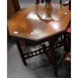 Antique octagonal oak table with turned legs and galleried stretchers, 70 x 70 x 70 cm. This lot