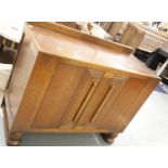 Vintage oak double door sideboard with carved central panel and two interior drawers, 51 x 120 x