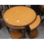 Unusual circular leather top coffee table with four matching occasional tables. This lot is not