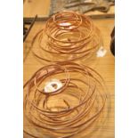 Two copper spiral pendant light shades. This lot is not available for in-house P&P