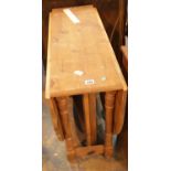 Stained pine drop leaf kitchen table. This lot is not available for in-house P&P