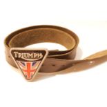 Triumph cast metal belt buckle. P&P Group 1 (£14+VAT for the first lot and £1+VAT for subsequent