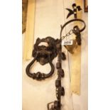 Cast metal lion mask door knocker and a pull bell. P&P Group 3 (£25+VAT for the first lot and £5+VAT