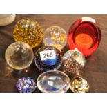 Nine mixed glass paperweights. P&P Group 3 (£25+VAT for the first lot and £5+VAT for subsequent