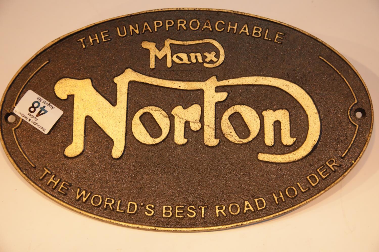 Cast iron Manx Norton sign, 33 x 20 cm. P&P Group 2 (£18+VAT for the first lot and £2+VAT for