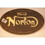 Cast iron Manx Norton sign, 33 x 20 cm. P&P Group 2 (£18+VAT for the first lot and £2+VAT for