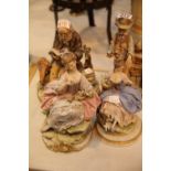 Four large figurines including two Capodimonte, The Bowler and Tramp Reading. This lot is not