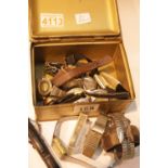 Vintage tin with wristwatch and parts contents. P&P Group 1 (£14+VAT for the first lot and £1+VAT