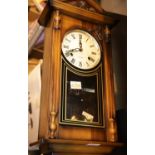 Wooden cased 31 day wall clock. This lot is not available for in-house P&P