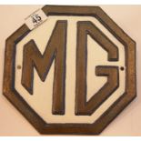 Cast iron MG black and white sign, 24 x 24 cm. P&P Group 2 (£18+VAT for the first lot and £2+VAT for
