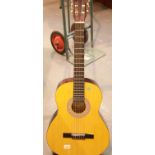 Six string acoustic guitar by Encore. This lot is not available for in-house P&P