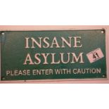 Cast iron Insane Asylum sign, 27 x 13 cm. P&P Group 2 (£18+VAT for the first lot and £2+VAT for