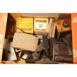 Box of vintage photographic items to include boxed developing tanks, Polaroid etc. This lot is not