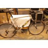 Tempest GT trail bike with front suspension, 18 gears and 22" frame. This lot is not available for