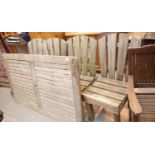 Large rectangular teak garden table and four pine garden chairs. This lot is not available for in-