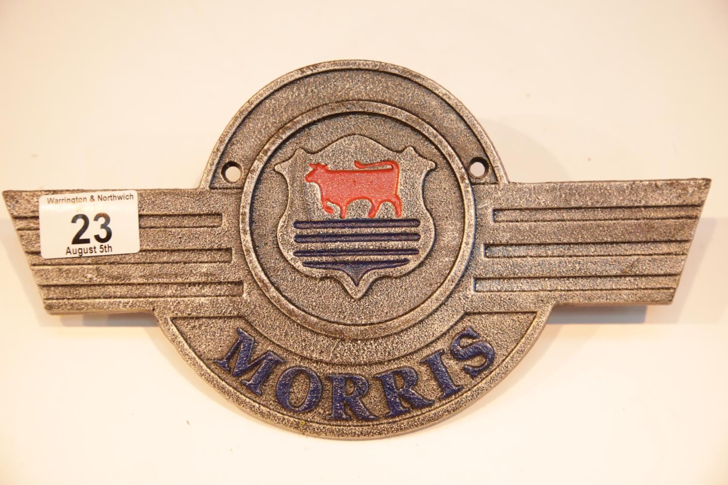 Cast iron Morris sign, 28 x 15 cm. P&P Group 2 (£18+VAT for the first lot and £2+VAT for