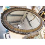 Large antique bevelled edge oval mirror. This lot is not available for in-house P&P