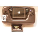 Sega game gear portable video game system with two games, Sonic the Hedgehog and Ayrton Senna