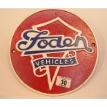 Cast iron Foden circular sign, D: 24 cm. P&P Group 2 (£18+VAT for the first lot and £2+VAT for