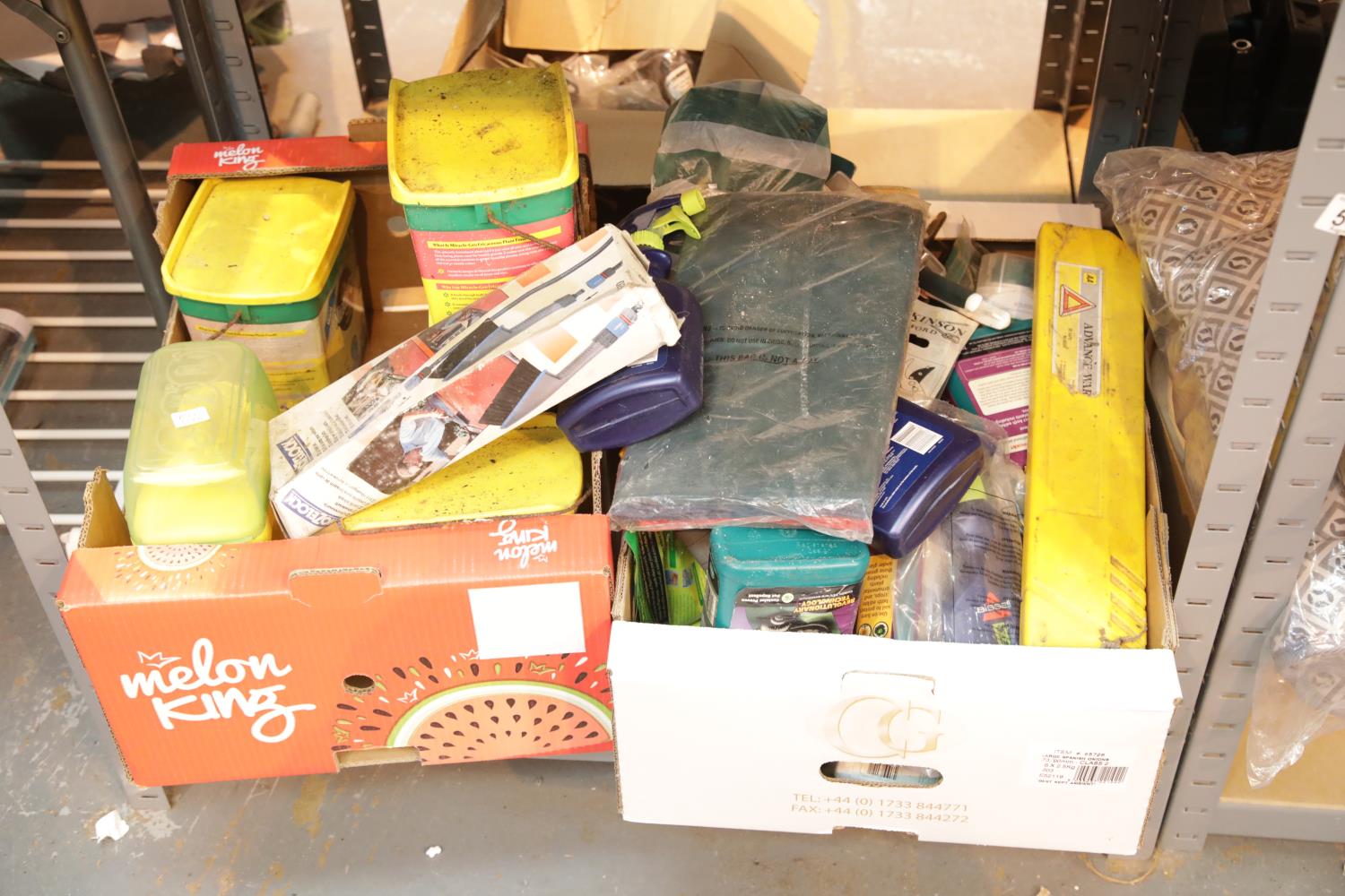 Two shelves of gardening and household electric including boxed garden light, mini weather van