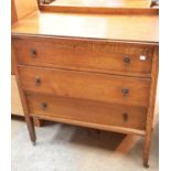 Oak three drawer chest of drawers on castors. This lot is not available for in-house P&P.