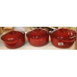 Three Le Creuset type casserole dishes with lids. This lot is not available for in-house P&P