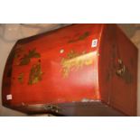 Red lacquered Oriental type dome top trunk. This lot is not available for in-house P&P