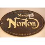 Cast iron Manx Norton sign, 38 x 20 cm. P&P Group 2 (£18+VAT for the first lot and £2+VAT for