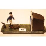 Cast iron football moneybox, L: 24 cm. P&P Group 3 (£25+VAT for the first lot and £5+VAT for
