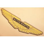 Cast iron Aston Martin wings sign, 33 x 8 cm. P&P Group 2 (£18+VAT for the first lot and £2+VAT