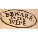 Cast iron Beware of The Wife sign, 17 x 9 cm. P&P Group 2 (£18+VAT for the first lot and £2+VAT
