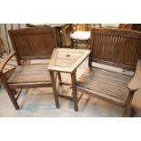 Two wooden garden chairs with central table. This lot is not available for in-house P&P