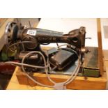 Vintage singer sewing machine with accessories. This lot is not available for in-house P&P.